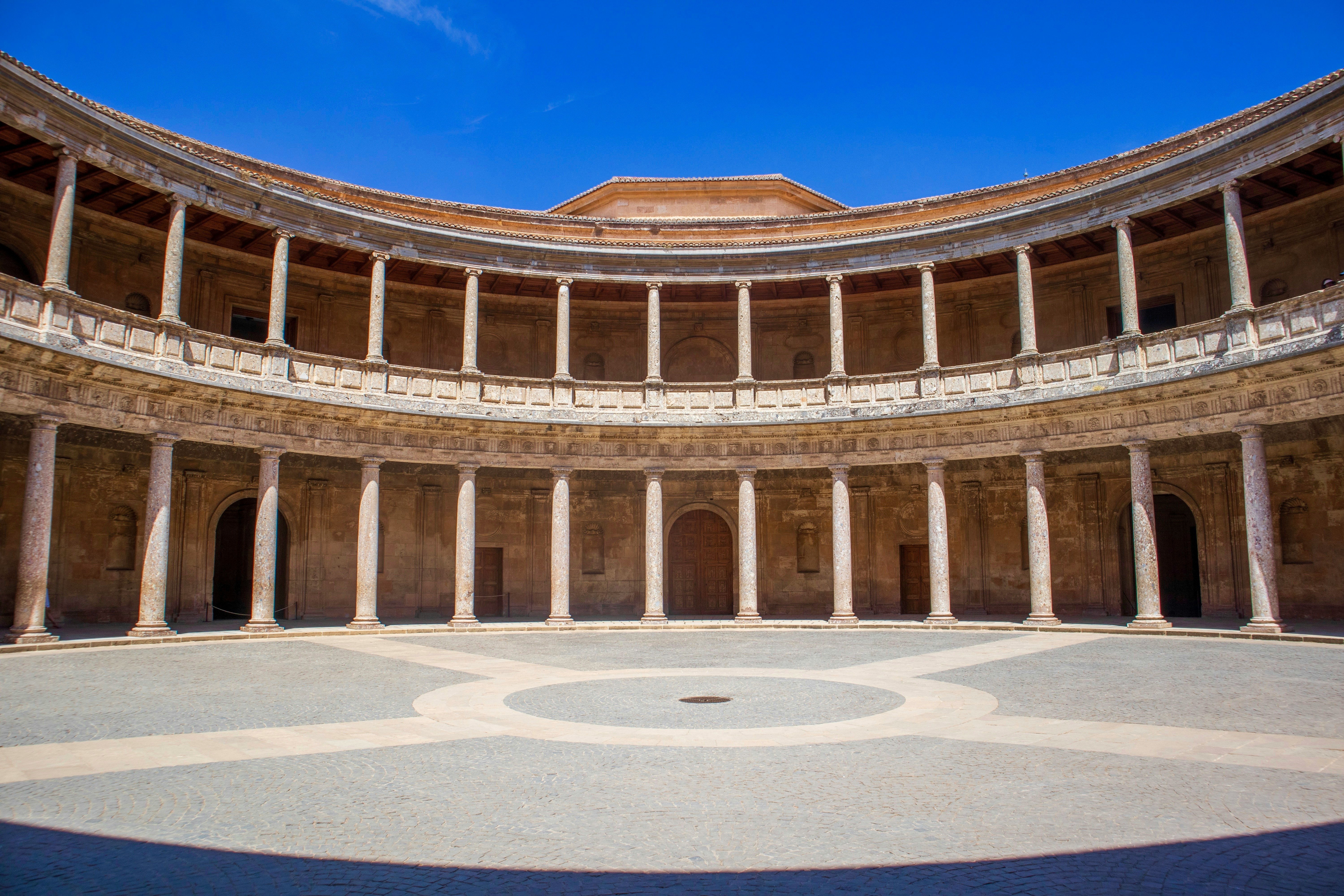 architectural photography of brown and white coliseum